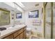 Functional bathroom with a sink, toilet, and shower, all well-maintained and brightly lit at 7623 Radcliffe Cir # 112A, Port Richey, FL 34668