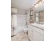 Bathroom featuring a bathtub, shower, and a vanity with white cabinets at 7700 Sun Island S Dr # 608, South Pasadena, FL 33707