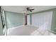 Bedroom featuring large closet and neutral color palette at 7700 Sun Island S Dr # 608, South Pasadena, FL 33707