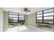 Bedroom featuring large windows offering city views at 7700 Sun Island S Dr # 608, South Pasadena, FL 33707