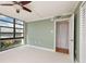 Bedroom featuring large windows and a closet at 7700 Sun Island S Dr # 608, South Pasadena, FL 33707