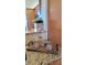 Granite countertop featuring tasteful decorative elements adding a touch of elegance to the area at 7700 Sun Island S Dr # 608, South Pasadena, FL 33707