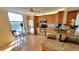 Bright kitchen features wooden cabinets, granite countertops and stainless steel appliances at 7700 Sun Island S Dr # 608, South Pasadena, FL 33707