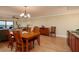 Living and dining area offers an open floor plan, wood floors, and views from every angle at 7700 Sun Island S Dr # 608, South Pasadena, FL 33707