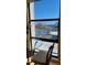 This beautiful view showcases a building, tennis court, and sunny skies at 7700 Sun Island S Dr # 608, South Pasadena, FL 33707