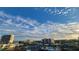 Breathtaking sky view over the town, showcasing nearby buildings and a tranquil body of water at 7700 Sun Island S Dr # 608, South Pasadena, FL 33707