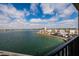 Beautiful water view of a condo complex with blue skies and a large body of water at 7700 Sun Island S Dr # 608, South Pasadena, FL 33707