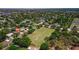 The home is near a lush green field, offering open space for activities and recreation in the community at 834 Riverside Dr, Tarpon Springs, FL 34689