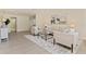 Comfortable living room featuring neutral tones, sleek flooring, and stylish accents at 834 Riverside Dr, Tarpon Springs, FL 34689