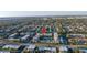 Community aerial view of a multi-story building, highlighting the unit's location within the complex and neighborhood at 8681 Bardmoor Blvd # 208C, Seminole, FL 33777