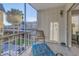 Screened patio with relaxing outdoor seating and views of the neighborhood at 8681 Bardmoor Blvd # 208C, Seminole, FL 33777