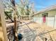 View of home with wooden patio area and lush backyard at 9377 Preston Rd, Brooksville, FL 34601