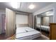 Bedroom showcasing pull down murphy bed and closet with mirrored doors at 9377 Preston Rd, Brooksville, FL 34601