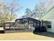 Enclosed patio offering ample natural light and space for outdoor enjoyment at 9377 Preston Rd, Brooksville, FL 34601