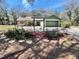 Inviting single-story home featuring a covered entry and well-maintained landscaping for enhanced curb appeal at 9377 Preston Rd, Brooksville, FL 34601