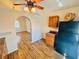 Traditional kitchen features laminate floors and black refrigerator at 9377 Preston Rd, Brooksville, FL 34601