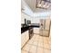 Kitchen with modern stainless steel appliances and black countertops at 9377 Preston Rd, Brooksville, FL 34601