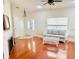 Open concept living room with hardwood floors, fireplace and natural light at 9377 Preston Rd, Brooksville, FL 34601