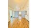 Inviting living room with hardwood floors, vaulted ceilings, and an open layout at 9377 Preston Rd, Brooksville, FL 34601