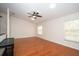 Inviting living room features hardwood floors, two large windows, and ample natural light at 9377 Preston Rd, Brooksville, FL 34601