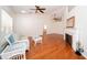 Spacious living room features wood floors, vaulted ceilings, and a cozy fireplace at 9377 Preston Rd, Brooksville, FL 34601