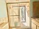 Bathroom featuring glass doors leading to the shower at 13076 Kanawha Dr, Weeki Wachee, FL 34614