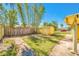A well-maintained shed in the backyard, with bamboo in the background at 1409 Castleworks Ln, Tarpon Springs, FL 34689