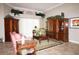 Cozy living room featuring classic furniture, decorative accents, and ample natural light at 16209 Belle Meade Blvd, Odessa, FL 33556