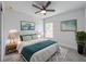 A serene bedroom with soft colors, comfortable bedding, and plenty of natural light at 22442 Peachland Blvd, Port Charlotte, FL 33954