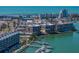 Scenic view of condo buildings with dock access to the ocean at 240 108Th Ave # 102, Treasure Island, FL 33706