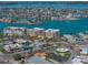 Beautiful waterfront condo complex with views of the bay and nearby restaurants and shops in a vibrant coastal setting at 240 108Th Ave # 102, Treasure Island, FL 33706