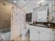 Well-appointed bathroom with a shower-tub combo and sleek vanity at 240 108Th Ave # 102, Treasure Island, FL 33706