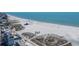 Vibrant beach scene with clear blue waters and a wide sandy shore, perfect for recreation and enjoying ocean views at 240 108Th Ave # 102, Treasure Island, FL 33706