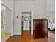 A bedroom has wood floors with a view into a large closet at 240 108Th Ave # 102, Treasure Island, FL 33706