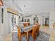 Dining area flows into the kitchen and offers access to a balcony with plenty of natural light at 240 108Th Ave # 102, Treasure Island, FL 33706