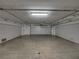 Spacious garage with multiple bays offers plenty of parking and storage at 240 108Th Ave # 102, Treasure Island, FL 33706