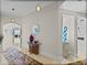 Elegant hallway with stylish decor and partial ocean view at 240 108Th Ave # 102, Treasure Island, FL 33706