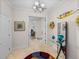 Elegant hallway with stylish decor and beautiful artwork at 240 108Th Ave # 102, Treasure Island, FL 33706