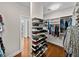 The walk-in closet is designed with shelving for shoes and storage at 240 108Th Ave # 102, Treasure Island, FL 33706