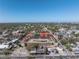 Overhead view of townhomes adjacent to a parking garage, situated amidst a vibrant cityscape with easy parking at 2402 W Azeele St # 423, Tampa, FL 33609