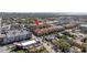 Aerial view of townhomes, located near stores and roadways, highlighting the area's retail access and connectivity at 2402 W Azeele St # 423, Tampa, FL 33609