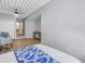 Bright bedroom features a walk-in closet and ensuite bathroom, providing ample space and convenience at 2402 W Azeele St # 423, Tampa, FL 33609