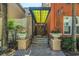 Inviting entrance with well-maintained steps, potted flowers, and a decorative awning, creating a welcoming ambiance at 2402 W Azeele St # 423, Tampa, FL 33609