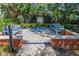 Secluded outdoor hot tub area with tropical foliage, comfortable seating, and a tranquil ambiance at 2402 W Azeele St # 423, Tampa, FL 33609