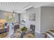 Bright living room featuring hardwood floors and large windows at 2402 W Azeele St # 423, Tampa, FL 33609