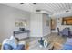 Open-concept living space with modern decor, hardwood floors, and ample natural light at 2402 W Azeele St # 423, Tampa, FL 33609