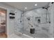 Luxurious bathroom with marble tile, glass enclosed shower, and modern fixtures at 315 40Th S St, St Petersburg, FL 33711