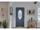 Welcoming entryway featuring a decorative front door, stylish decor, and a glimpse into the home's design at 315 40Th S St, St Petersburg, FL 33711