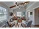 Bright living room boasts vaulted ceilings, wood beams, modern lighting, and stylish contemporary furnishings at 315 40Th S St, St Petersburg, FL 33711