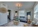 Comfortable living room presents inviting decor, lovely flooring, and lots of natural light at 315 40Th S St, St Petersburg, FL 33711